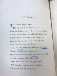 Image of the first page of "Dover Beach" with blue underlines in line seven under "ebb" and "sand" as well as line nine under "suck" 