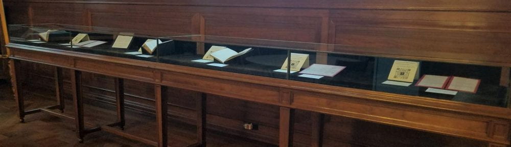 Exhibit cases with items in the Hankamer Treasure Room of the Armstrong Browning Library.