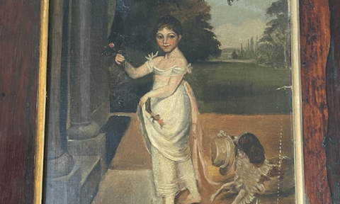Young girl walking with a dog pulling on her dress