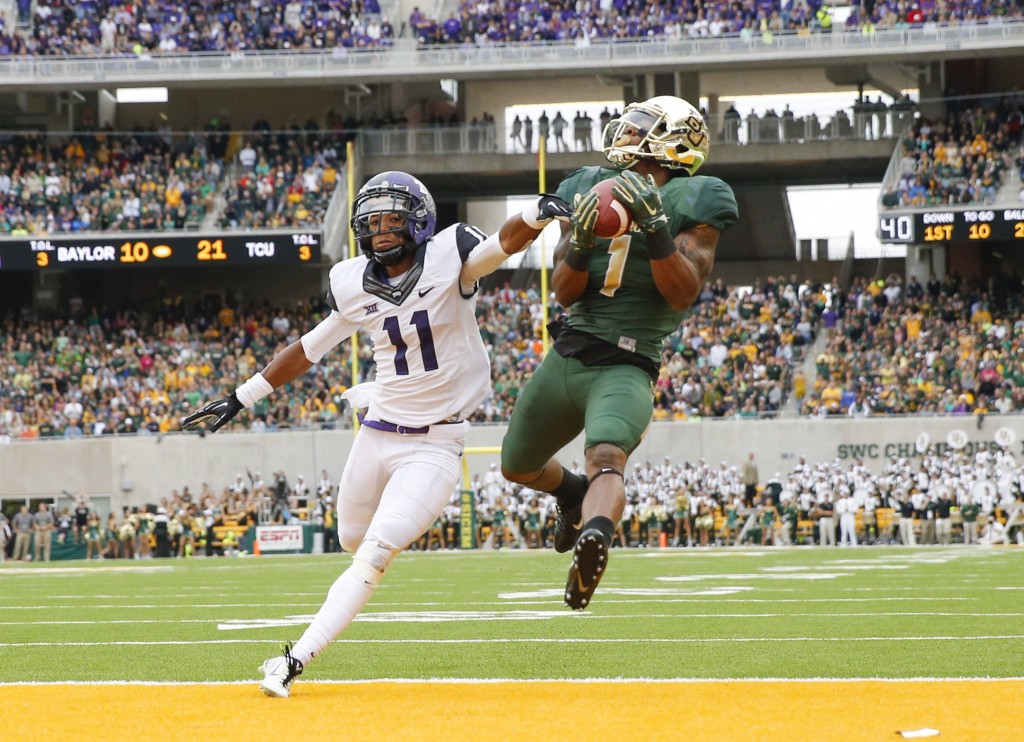 Oct 11, 2014; Waco, TX, USA; Baylor Bears wide receiver Corey Coleman (1) catches a touchdown pass over TCU Horned Frogs cornerback Ranthony Texada (11) during the first half at McLane Stadium. Mandatory Credit: Kevin Jairaj-USA TODAY Sports
