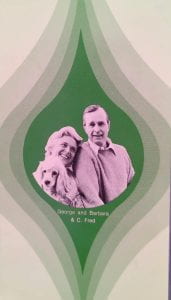 A Christmas card featuring George H. W. Bush, his wife Barbara, and dog
